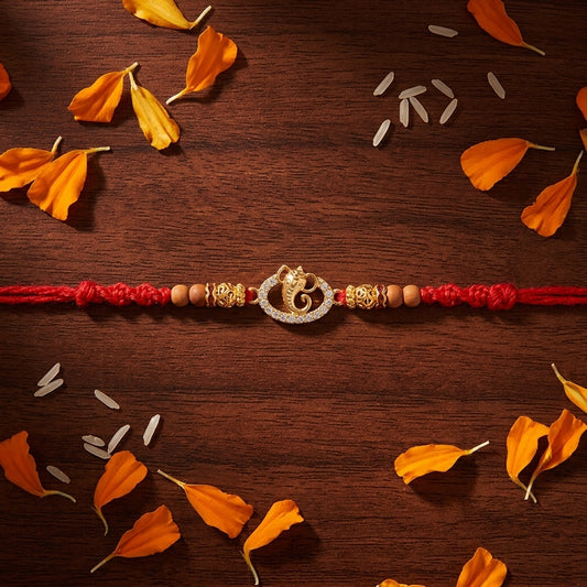 Divine Ganesha Stone-Studded Gold-Tone Rakhi