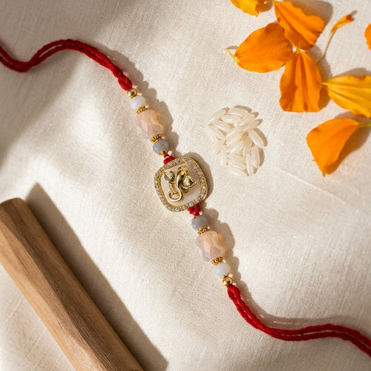 Rotating Ganesha Mother of Pearl Rakhi