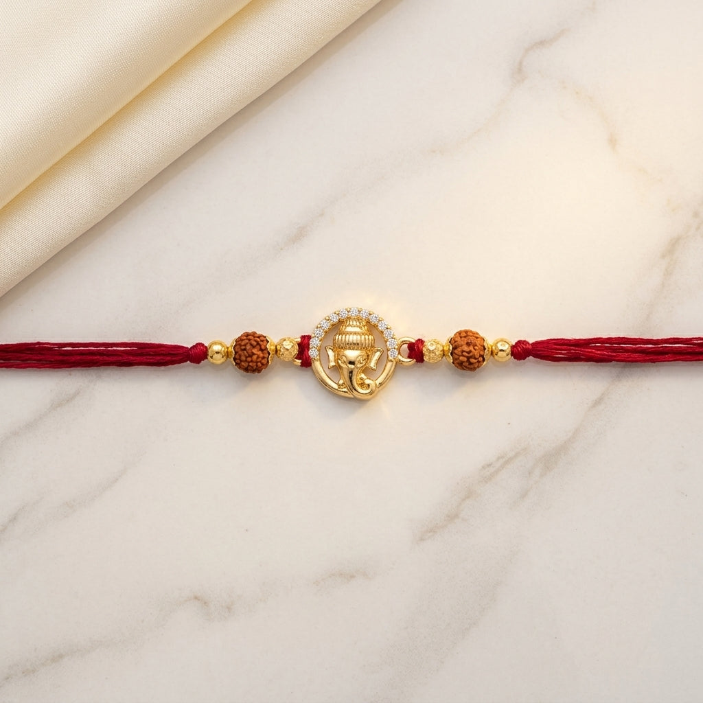 Gold Tone Ganesha Halo Rakhi
