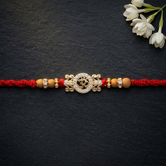 Exquisite Stone-Studded Om Designer Rakhi