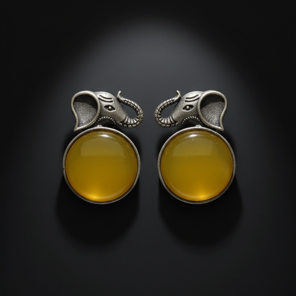 German Silver Elephant Stud Earrings with Yellow Stone