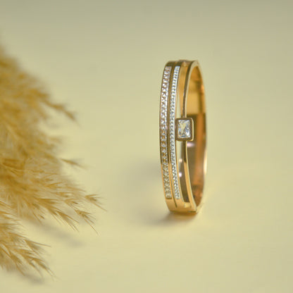 Elegant Dual-Tone Gold Bangle with Crystal Accent