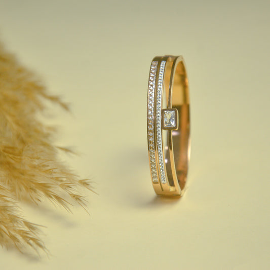 Elegant Dual-Tone Gold Bangle with Crystal Accent