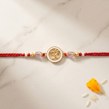 Elegant Om Enamel Rakhi with Crystal Beads