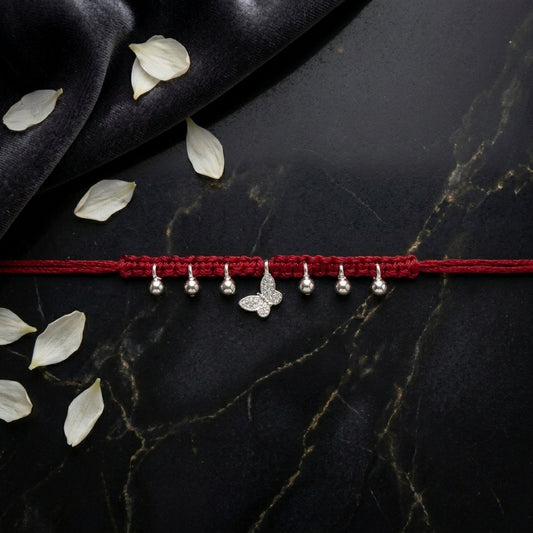 Elegant Silver Butterfly Charm Rakhi on Red Macrame Thread