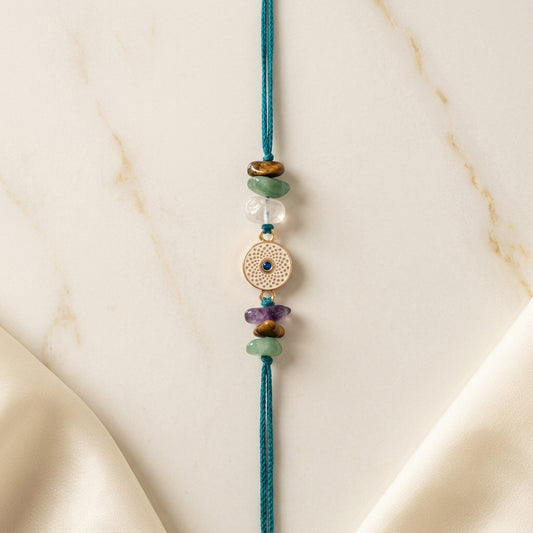 Healing Crystal Mandala Evil Eye Rakhi on Teal Thread