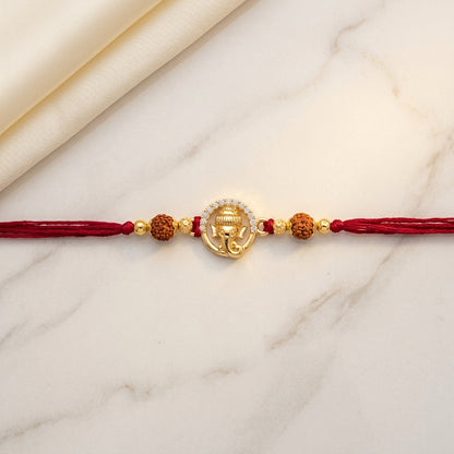 Gold Tone Ganesha Halo Rakhi