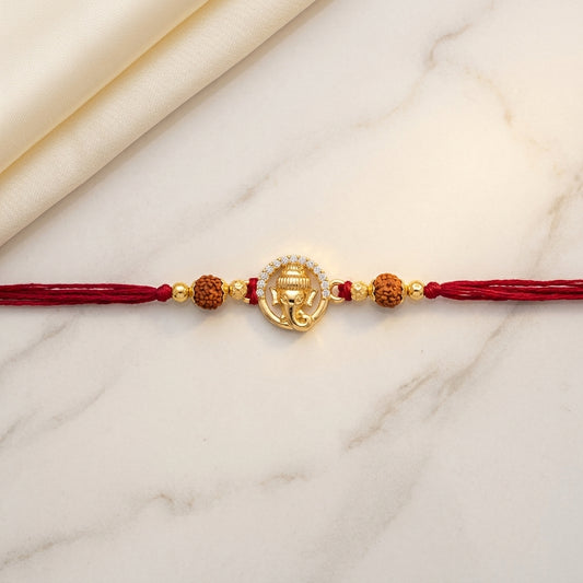 Gold Tone Ganesha Halo Rakhi