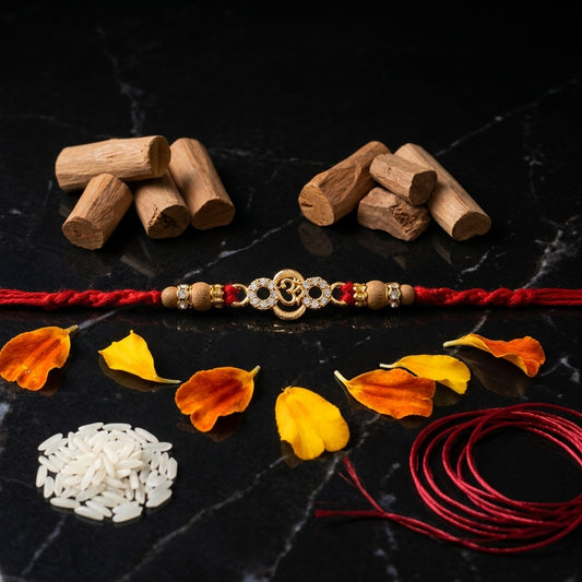 Exquisite Gold-Tone Om Designer Rakhi