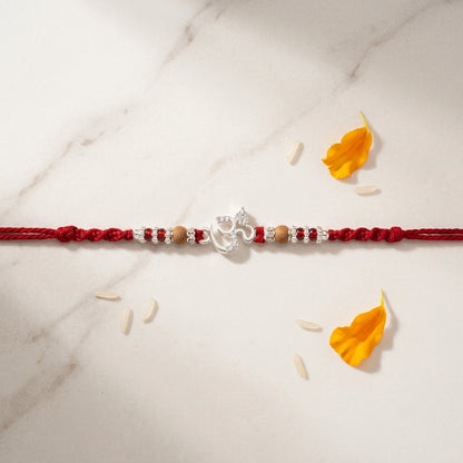Elegant Silver Tone Om Rakhi