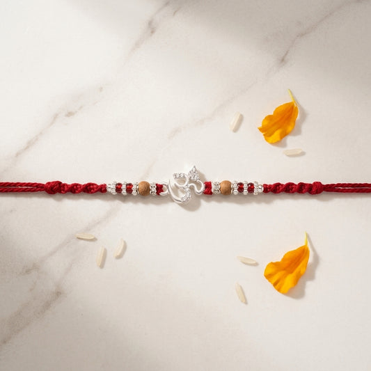 Elegant Silver Tone Om Rakhi