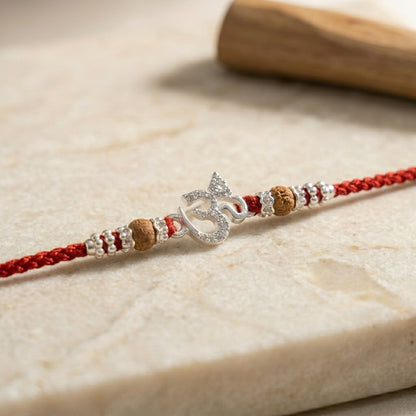 Elegant Silver Tone Om Rakhi