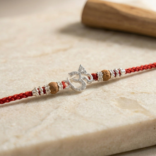 Elegant Silver Tone Om Rakhi