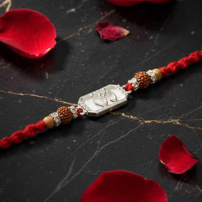 Elegant Silver Om Rakhi with Rudraksha Beads