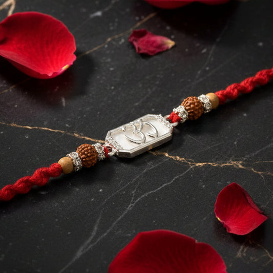 Elegant Silver Om Rakhi with Rudraksha Beads