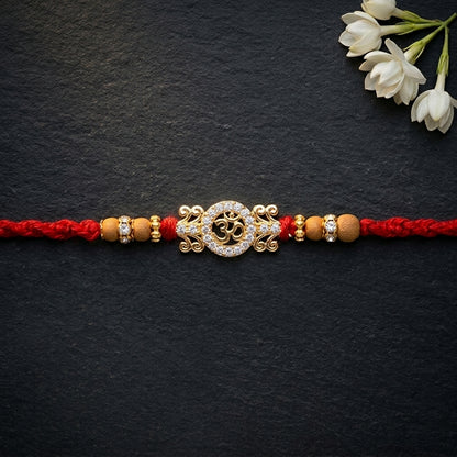Exquisite Stone-Studded Om Designer Rakhi