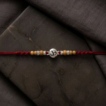 Elegant Silver-Tone 'Om' Rakhi