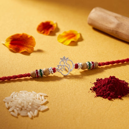 Sacred Silver-Tone Om Designer Rakhi