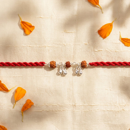 2 PC Rudraksha & Dainty Silver-Finish Bell Rakhi