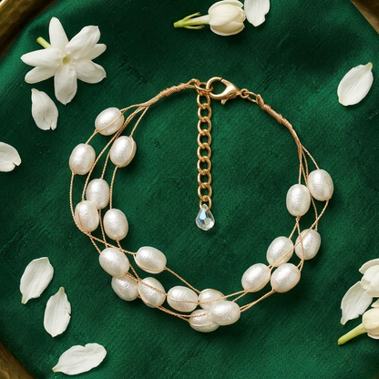 Gold-Tone Multi-Strand Textured Rice Pearl Bracelet | Lady Zone